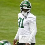 New York Jets rookie edge rusher David Bailey warms up during minicamp in Florham Park.