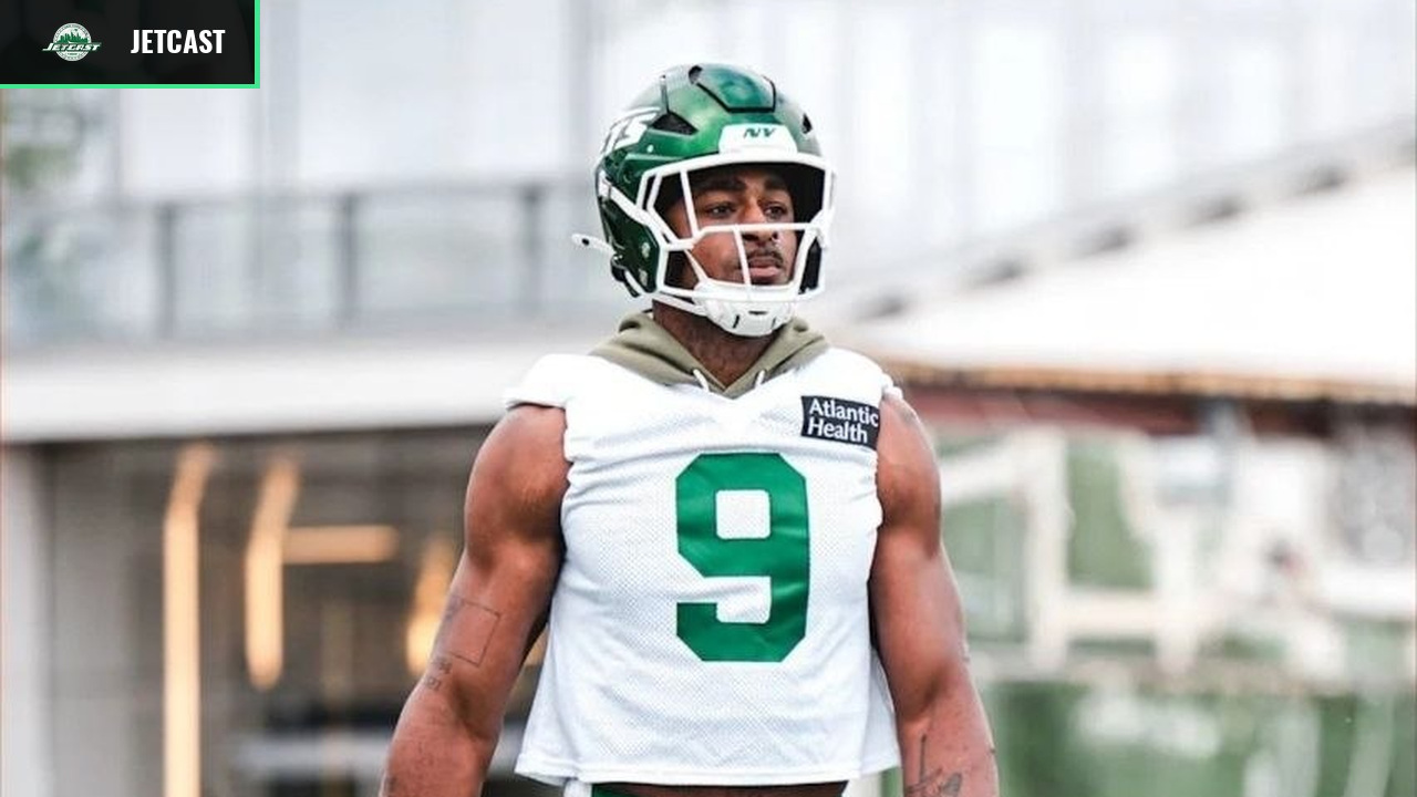 Will McDonald IV walks on the Jets practice field in his No. 9 jersey.
