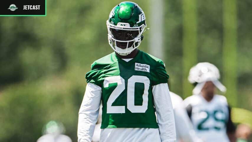 Breece Hall in a green New York Jets practice jersey during offseason work