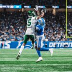 Garrett Wilson reaches for a pass against Detroit during the September 27, 2026 Jets-Lions game.