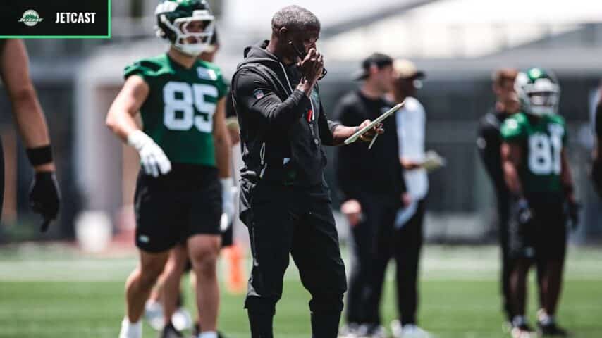 Aaron Glenn watches New York Jets practice during the 2026 offseason program.